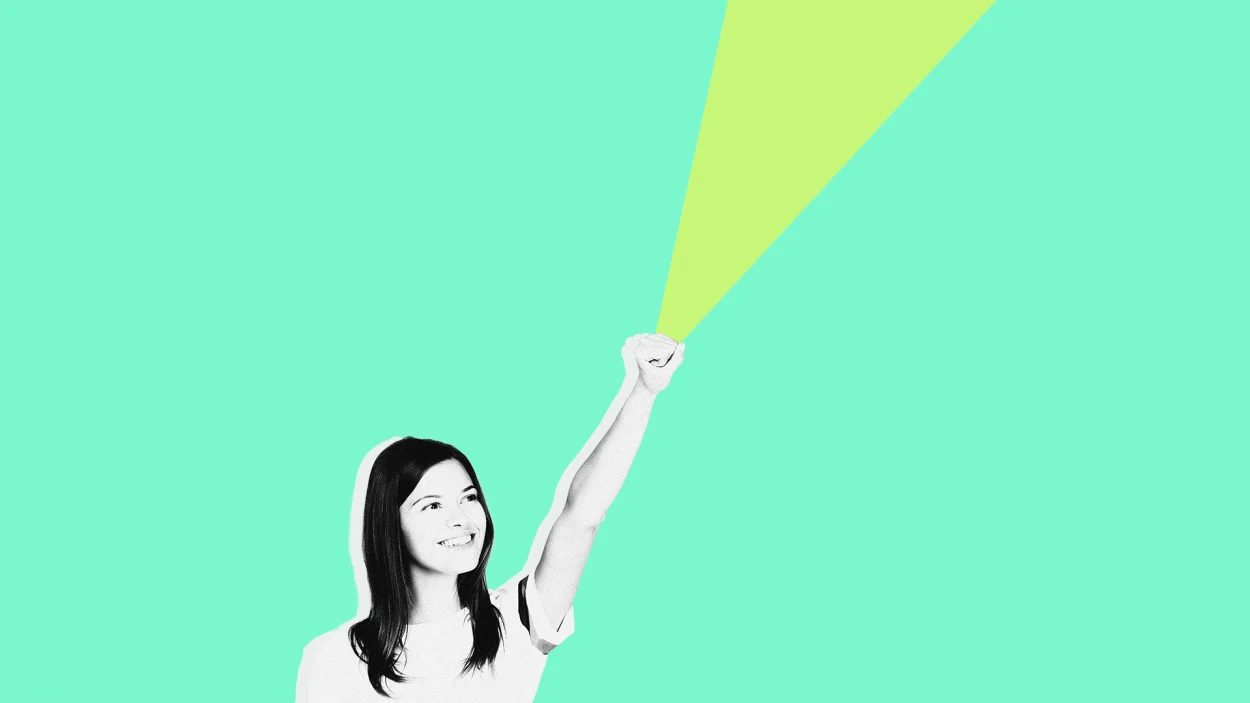 holding-up-firrst-with-light