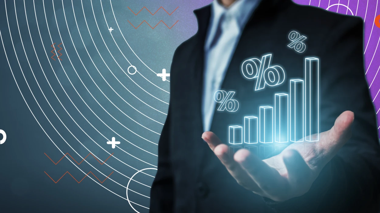 man-holding-tech-graphs