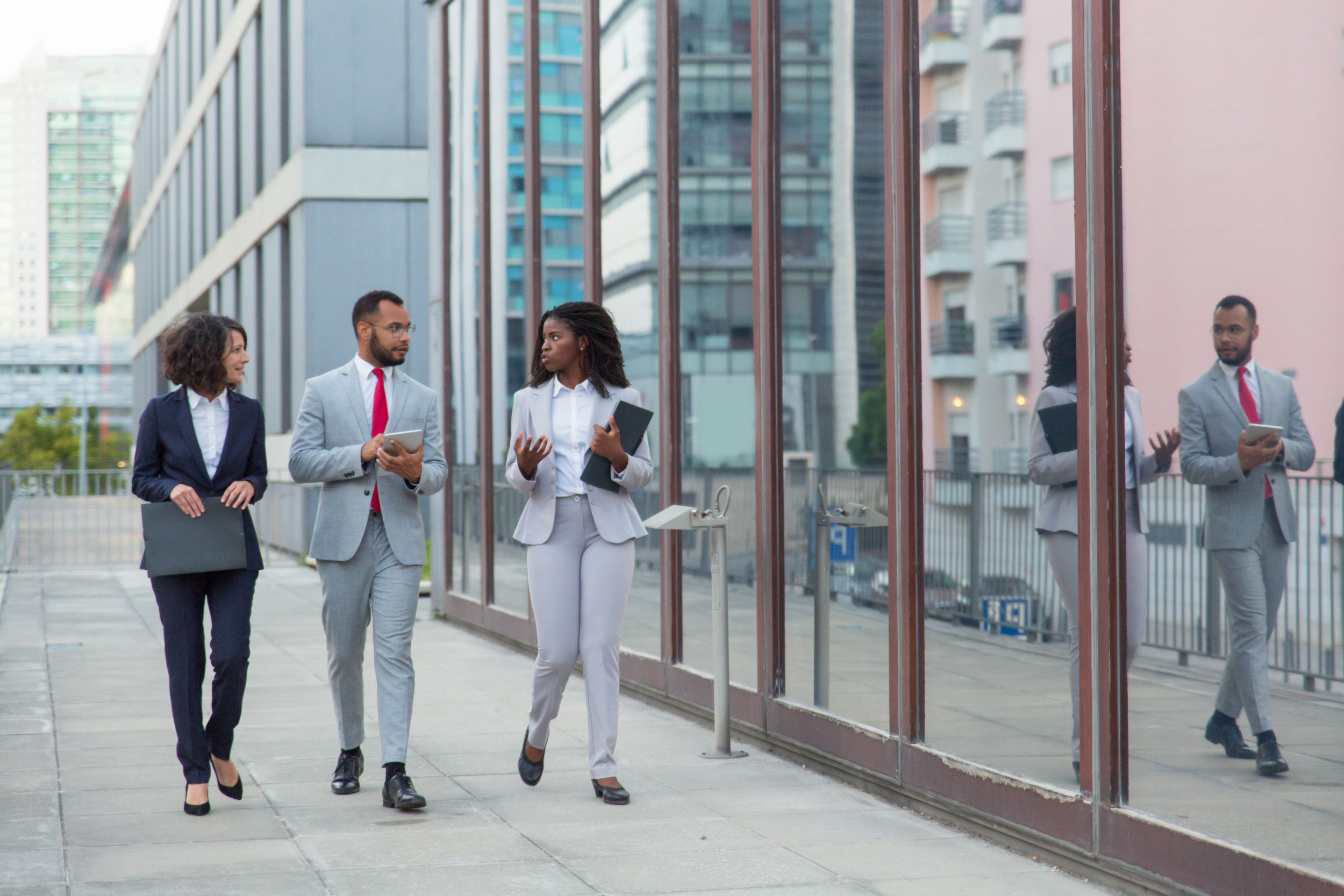 business-team-walking-down-street