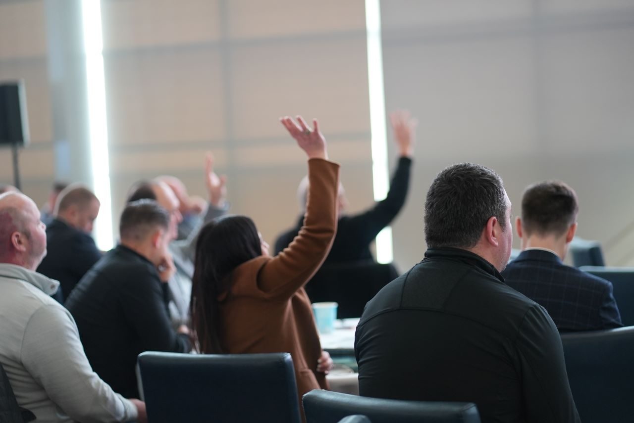 group-raising-hands