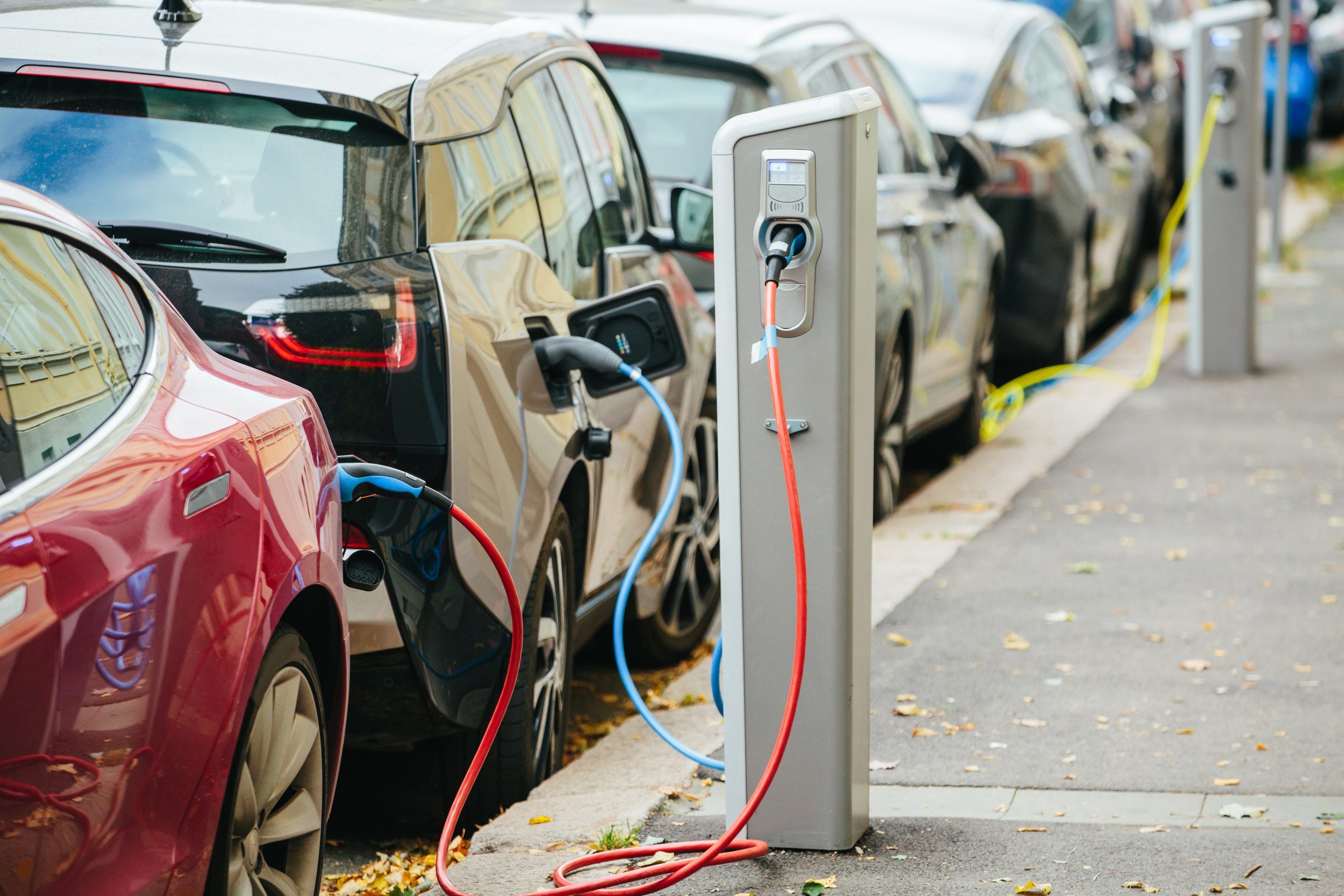 parked-ev-cars-charging-on-street